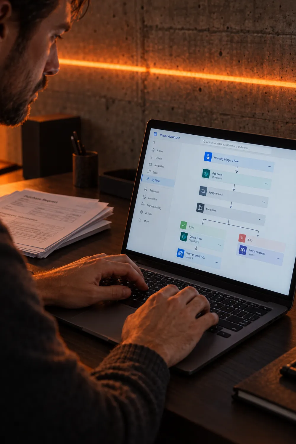 Person working on an approval workflow on a laptop